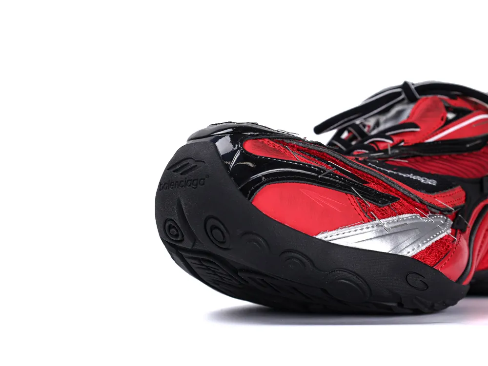 Red and silver leather sneaker with black rubber sole, featuring textured design.