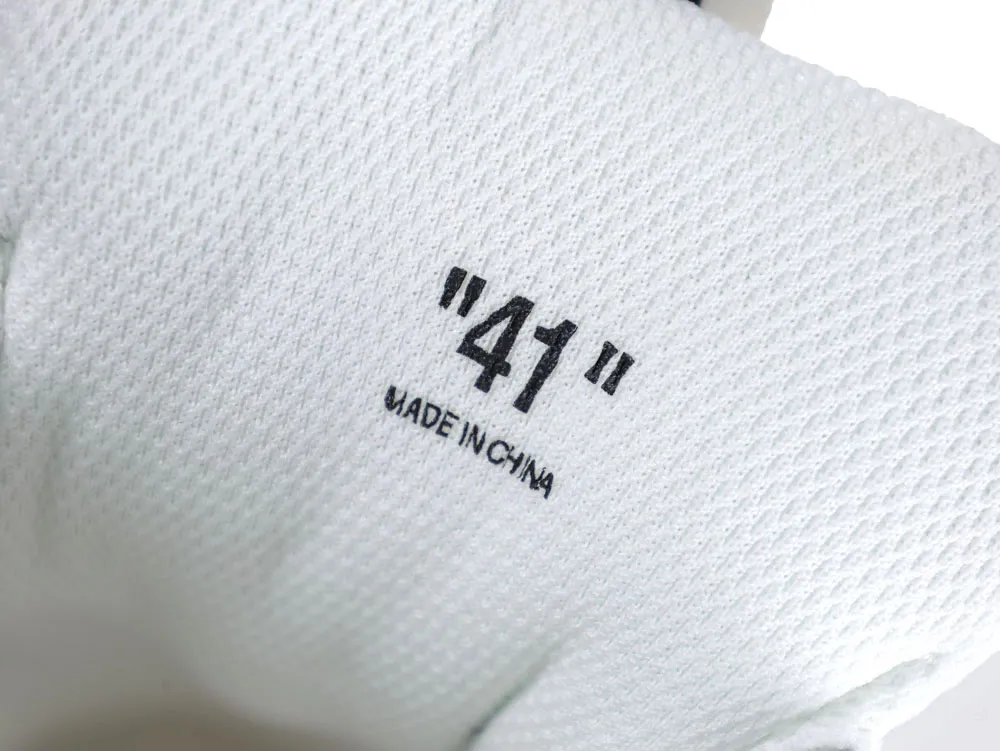 White textured fabric with black text, showing size "41" and "Made in China".