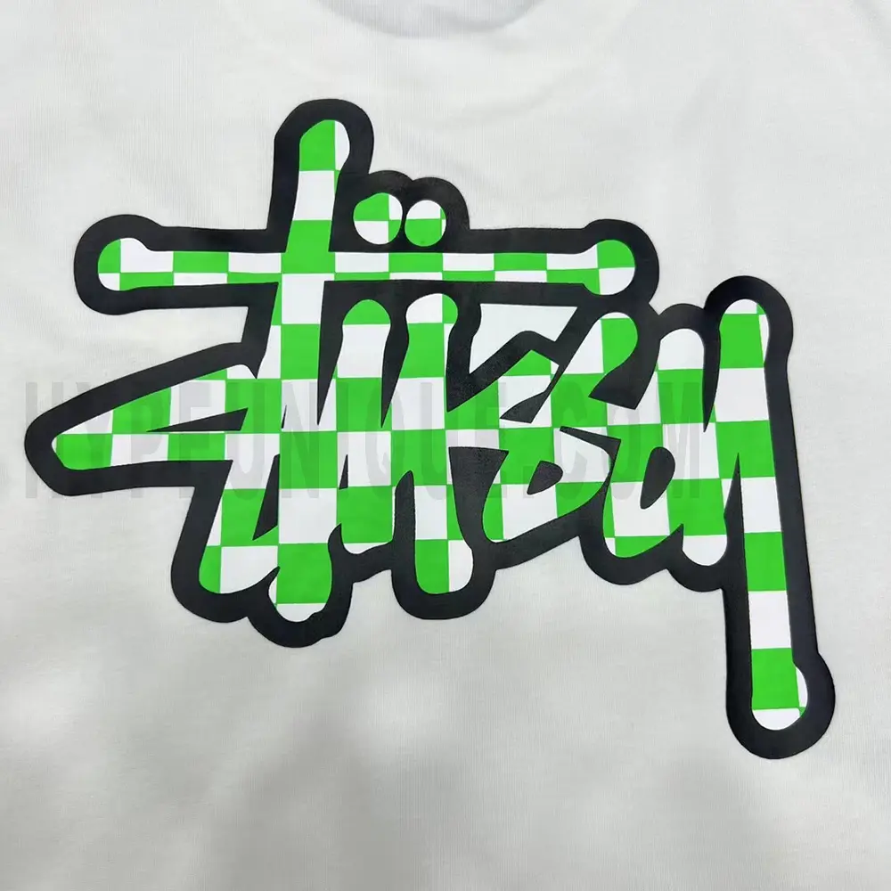 Close-up of the T-shirt print details of the white clothes.
