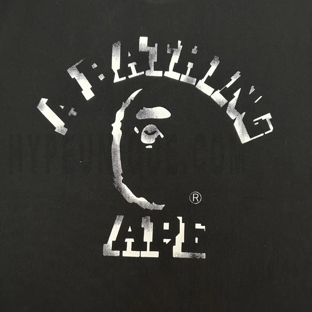 Close-up of the T-shirt print details of the front of the black clothes.