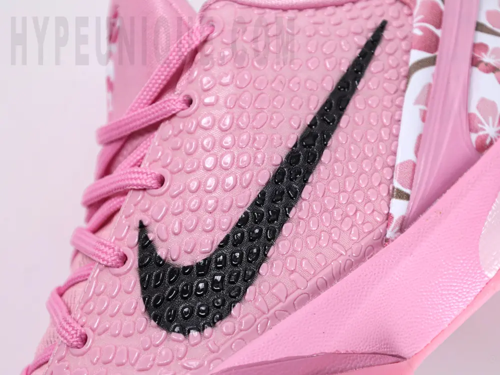 the black swoosh