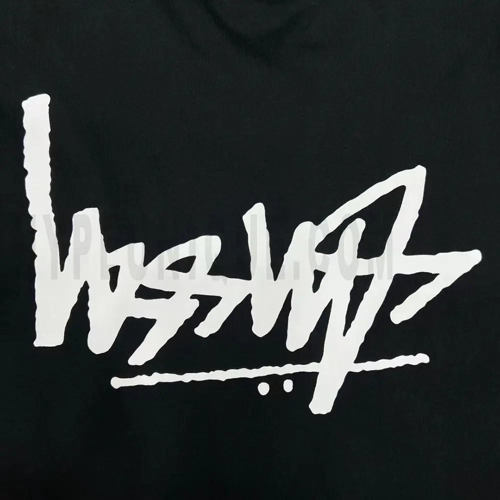 Close-up of the T-shirt print details of the back of the black clothes.