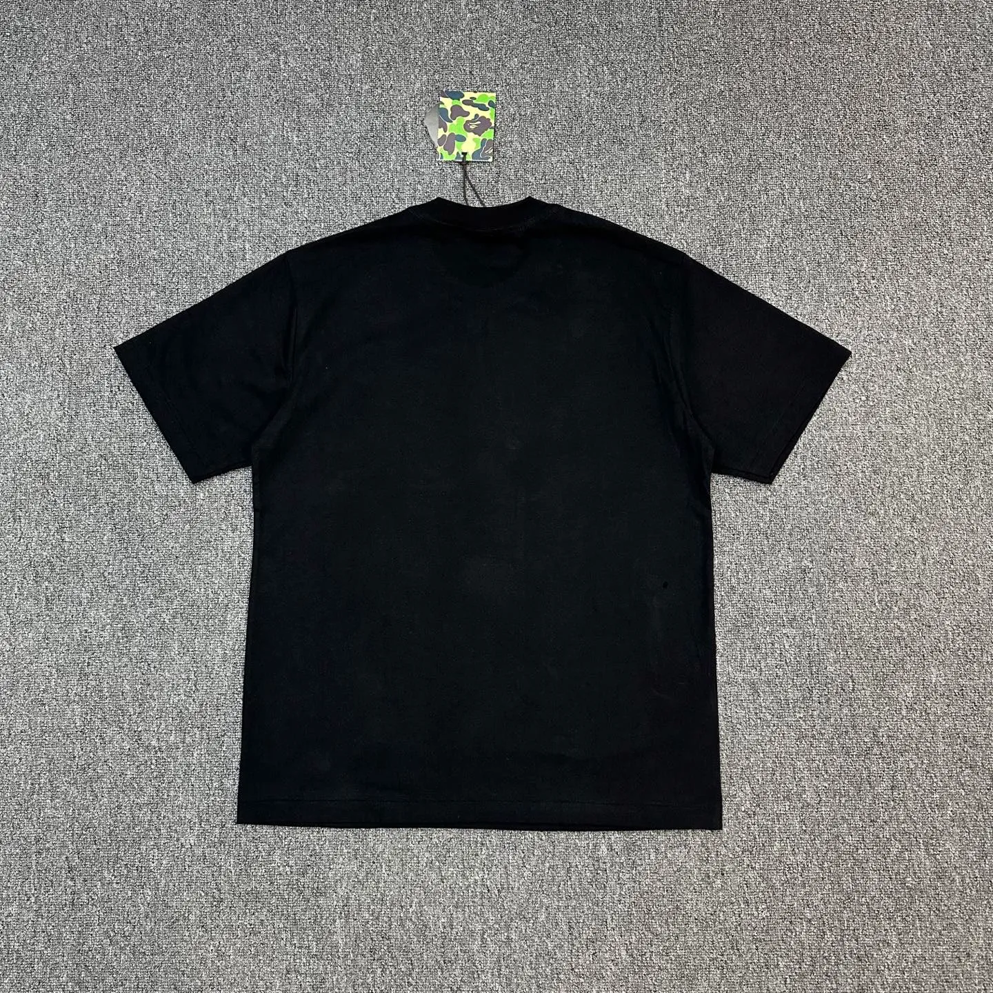 Back of BAPE SS25 1ST CAMO Mixed Color Ape Print T-Shirt Color Black