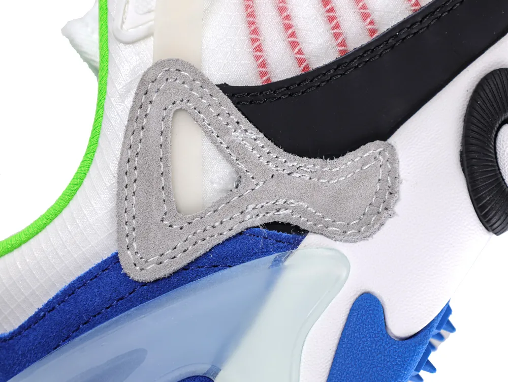 Close-up of multicolored sneaker with suede detailing and mesh fabric accents.