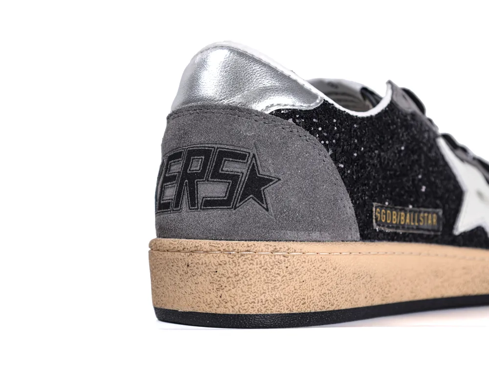Top view of black glitter and grey suede toe area of Golden Goose Ball Star