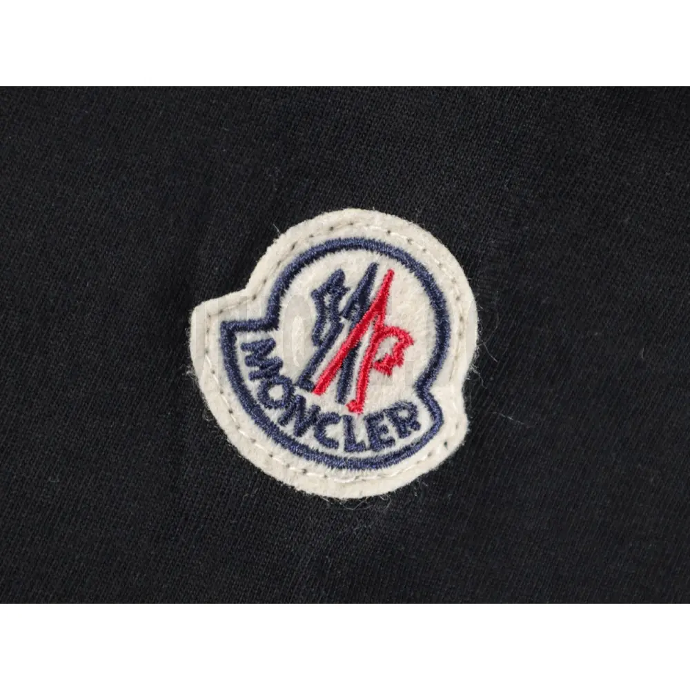 Embroidered graphic on the side of the T-shirt