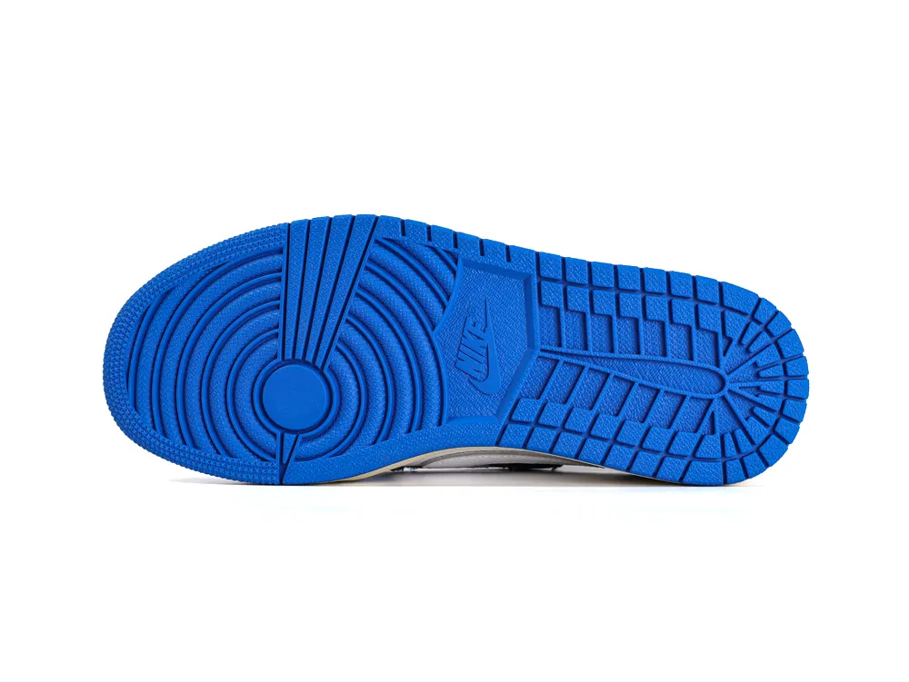 Bright blue rubber sole with textured pattern and branding.