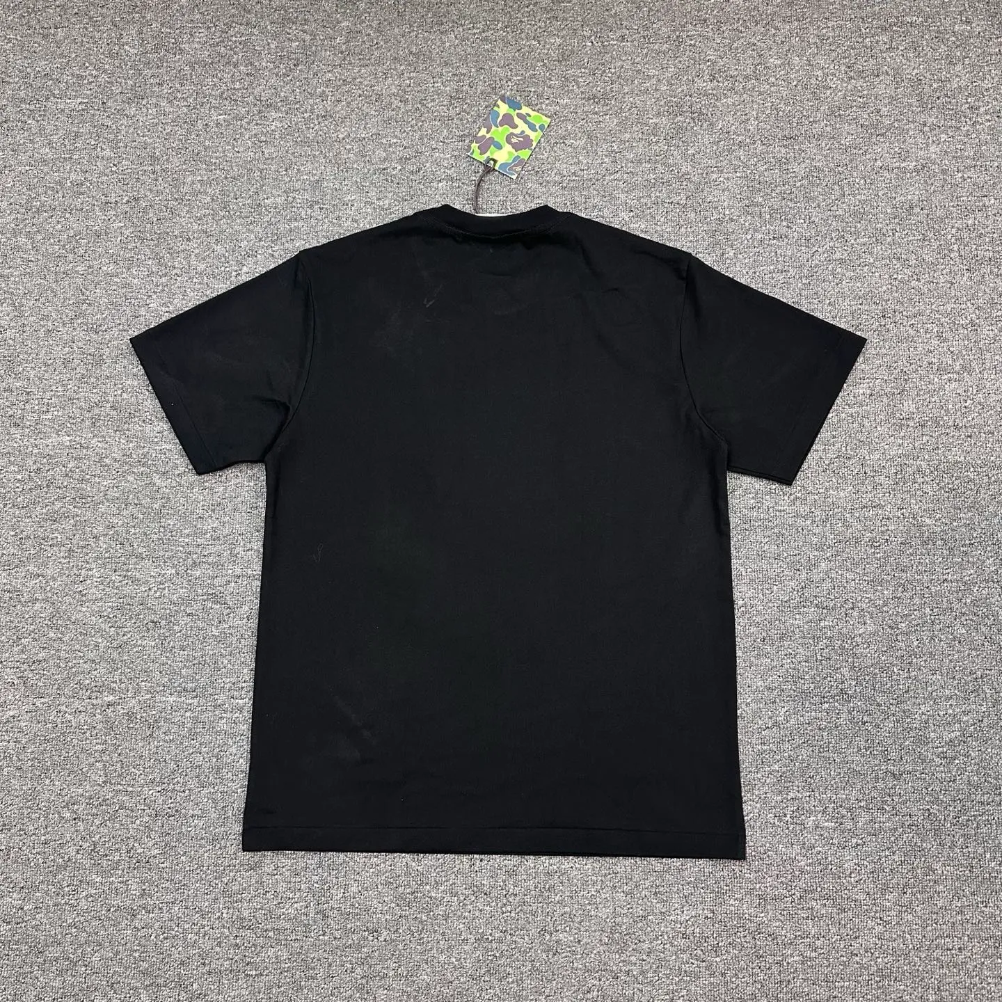 Back of BAPE SS26 Cartoon Monkey Glitter Print T-Shirt