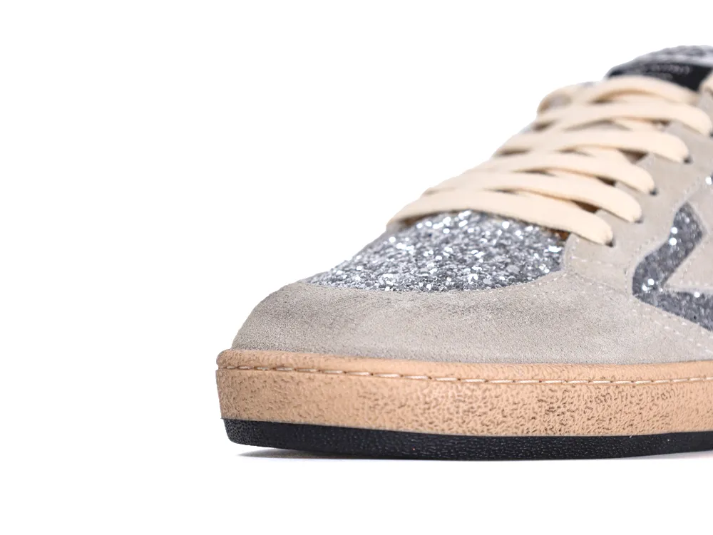 Front toe view of Golden Goose Ball Star sneakers in silver glitter and gray suede