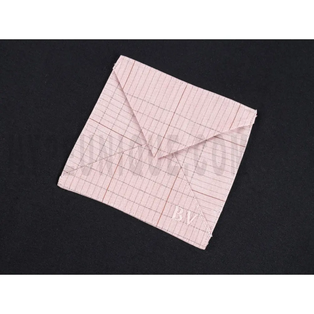 Embroidered graphic on the side of the T-shirt