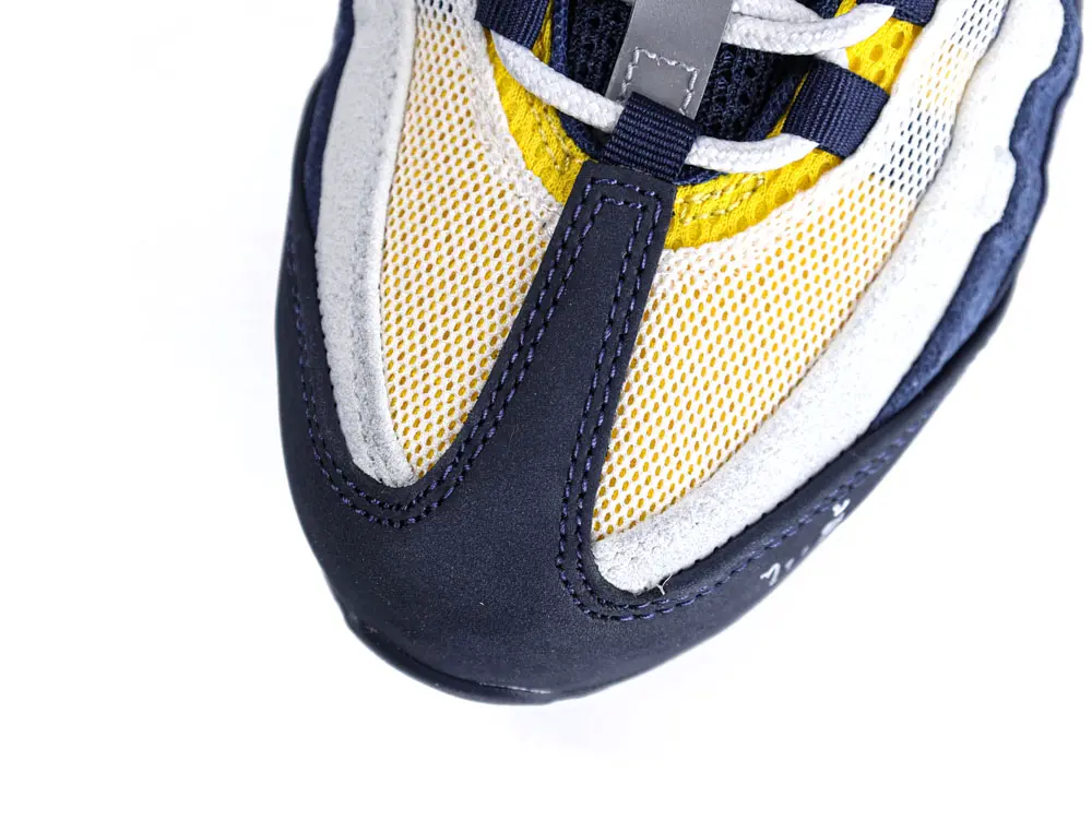 Stylish navy and yellow sneakers design