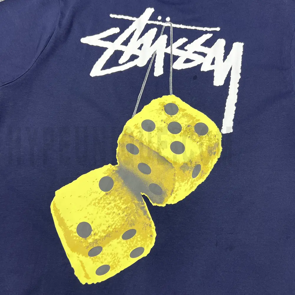 Close-up of the T-shirt print details of the back of the blue clothes.