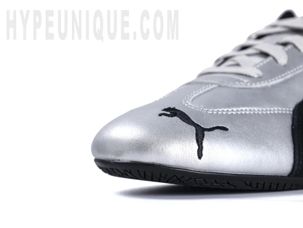 Puma Speedcat ‘Metallic Silver’ toe-side view. Silver leather upper with black Puma logo