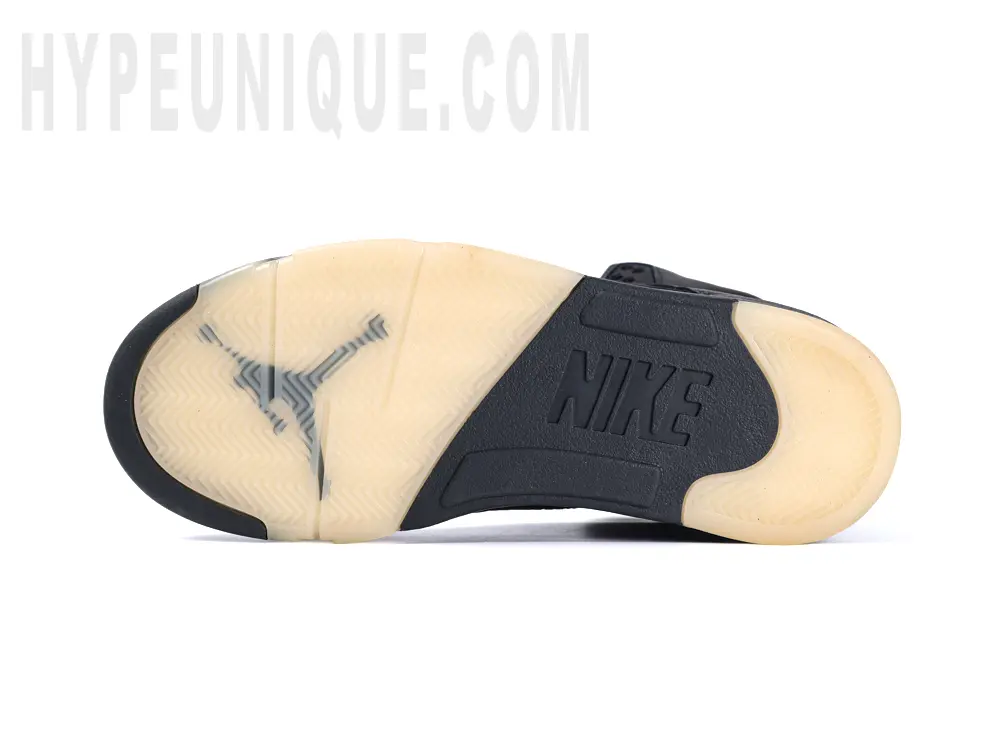 Beige and black rubber outsole of the Jordan 5 Retro PSG Paris Saint-Germain ‘Off Noir’, showcasing the durable plastic construction.