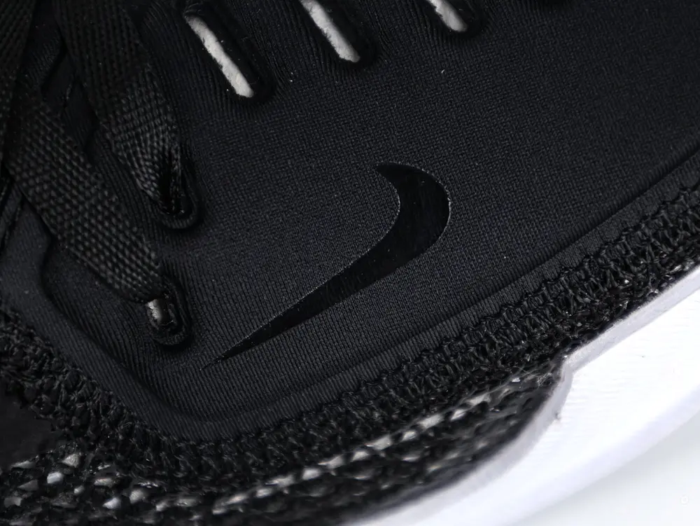 the black swoosh