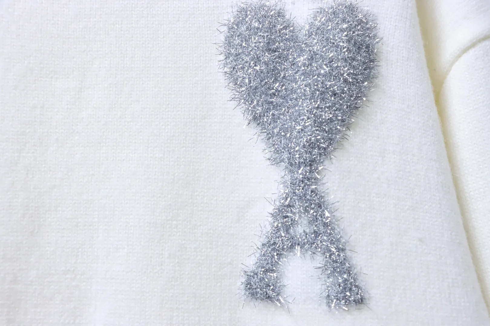 Silver Heart Logo Detail
