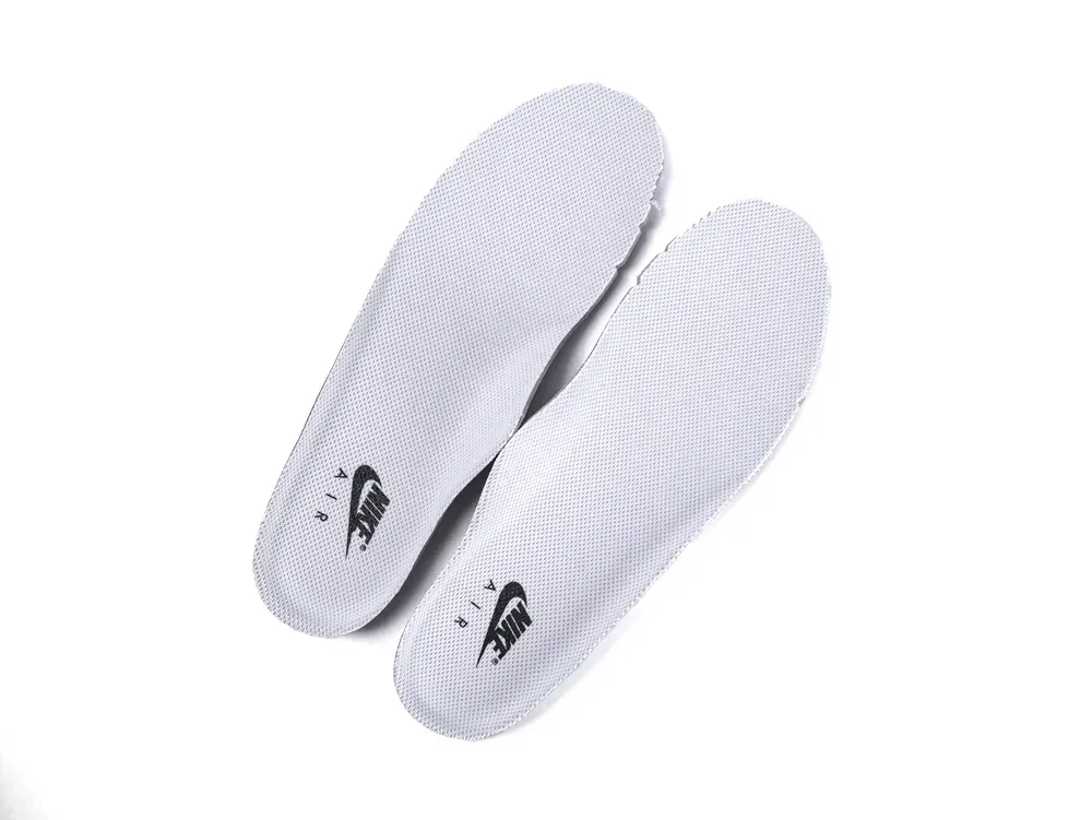 White fabric insoles with logo, designed for athletic shoes, provide comfort and support.
