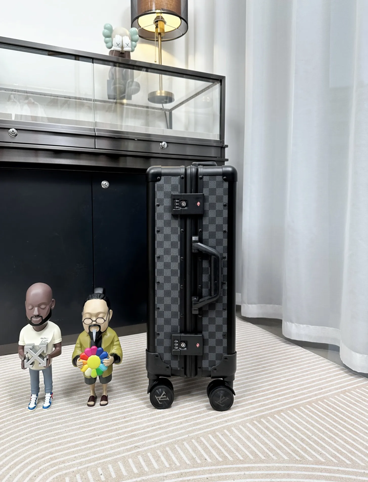 Damier Graphite rolling luggage side view
