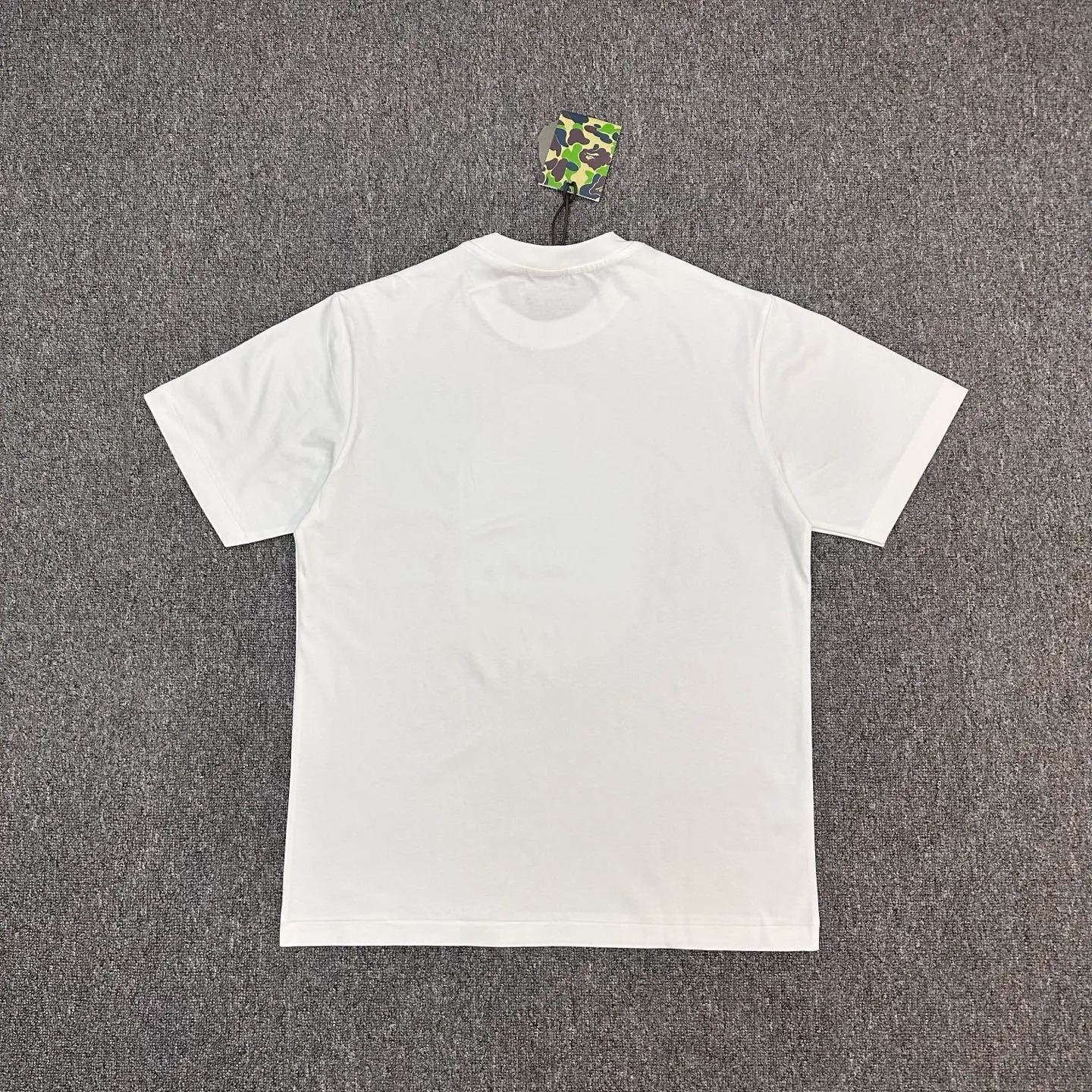 Back of BAPE SS23 Ape Pattern Striped Crew Neck T-Shirt Color White