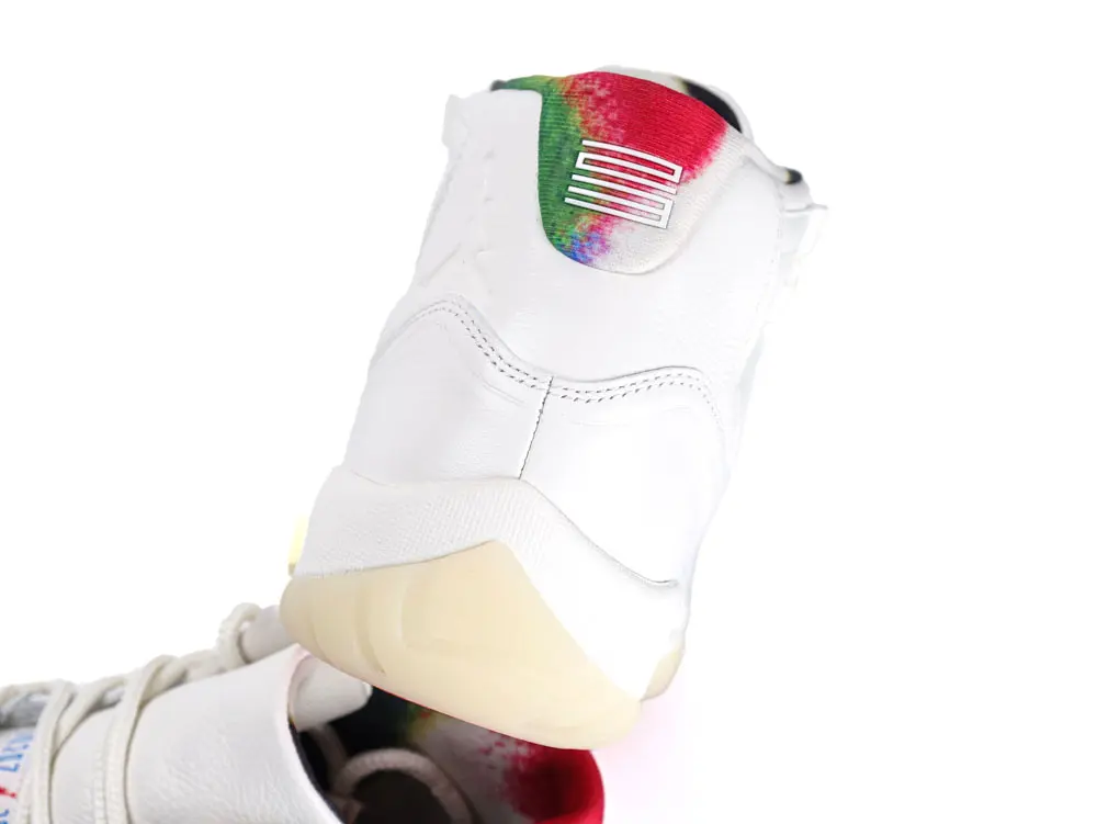 White sneaker with colorful heel detail