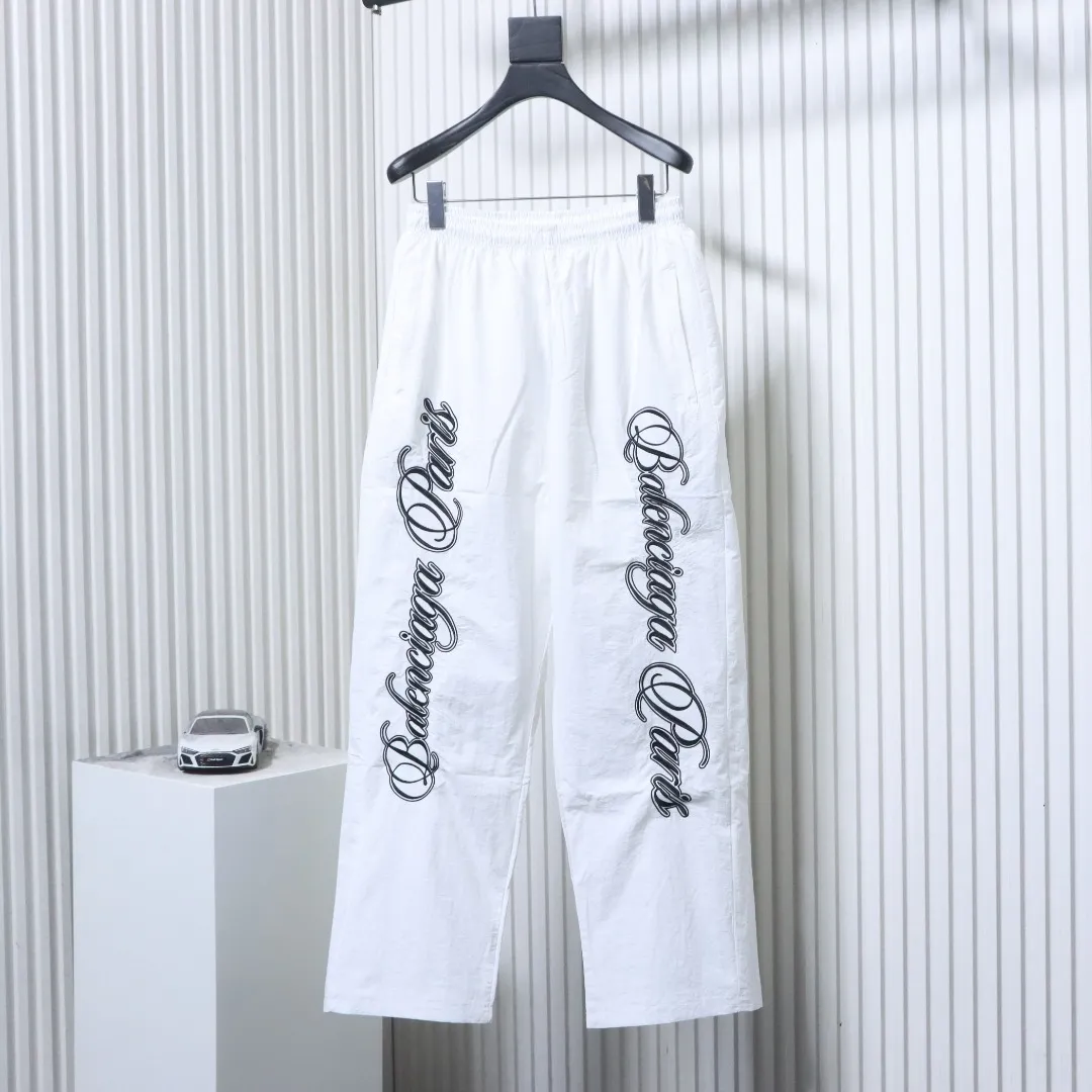 BLCG Cursive Signature Embroidered Tracksuit Pants Color White
