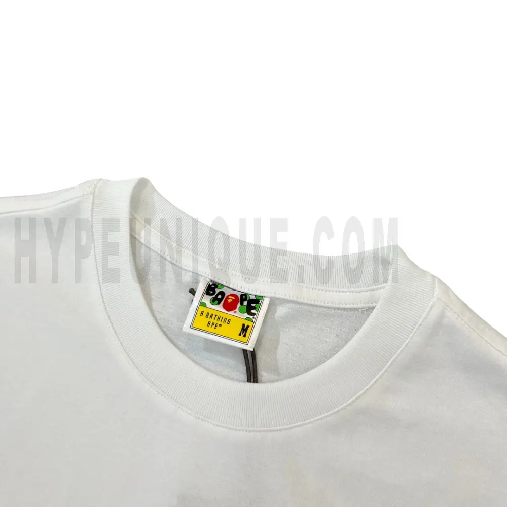 Neckline tag close-up, displaying garment care symbols and brand information with fashion-forward presentation.