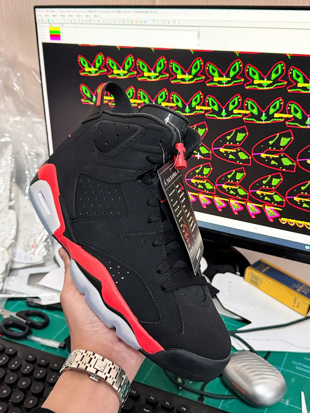 Close-up view of the outside of the right shoe