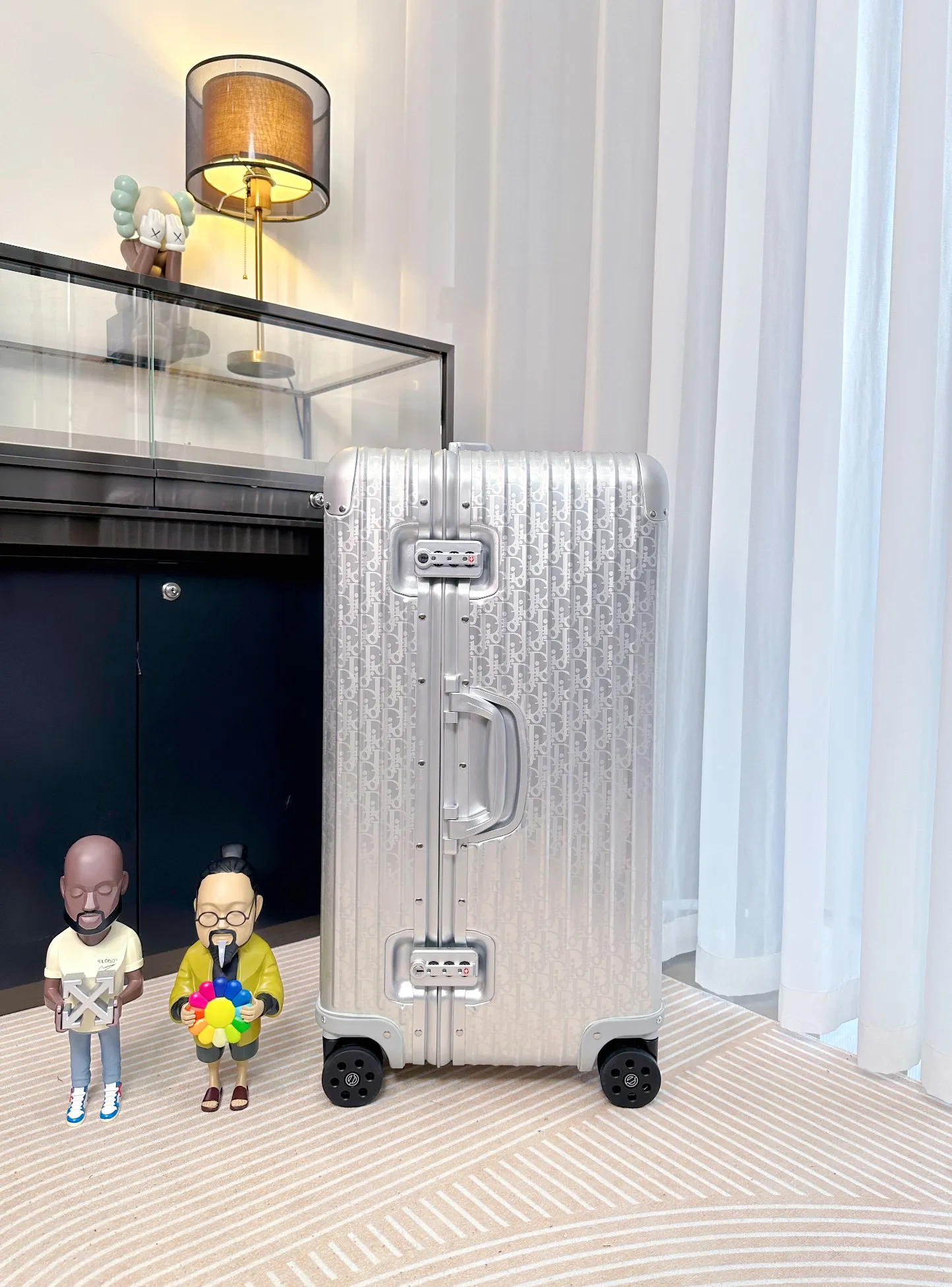 Silver suitcase with side handle and locks