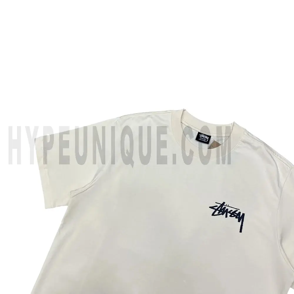 Close-up of the front of the beige T-shirt
