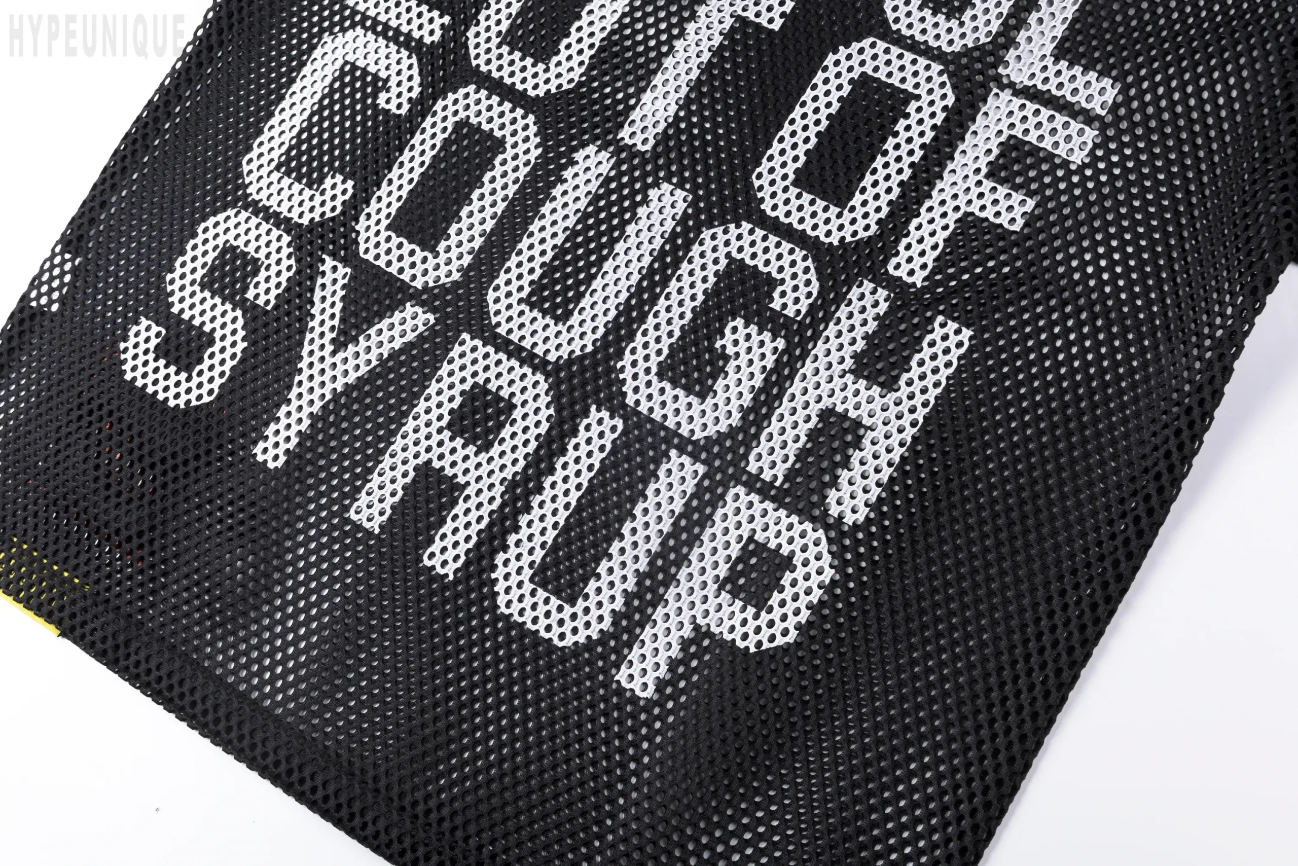 That's A Awful Lot of Cough Syrup Letter Mesh T-shirt, back view. Showing the black offset print details.