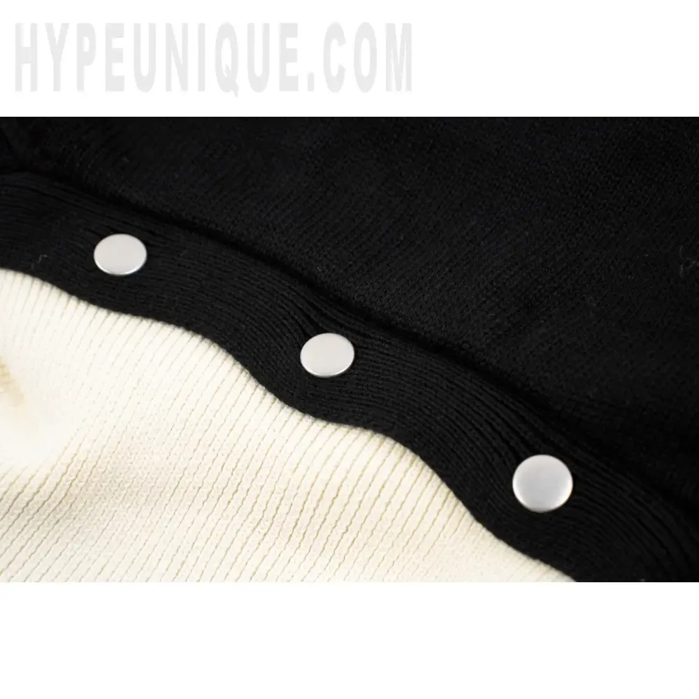 Close-up of button detail on the clothes