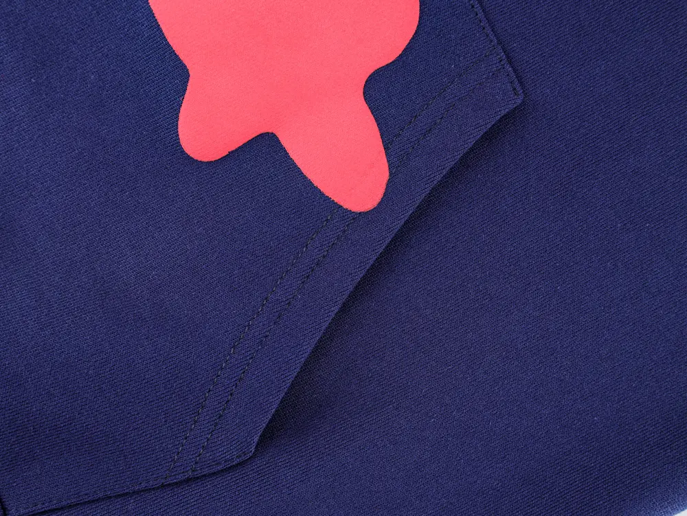the sp5der pink hoodie pocket