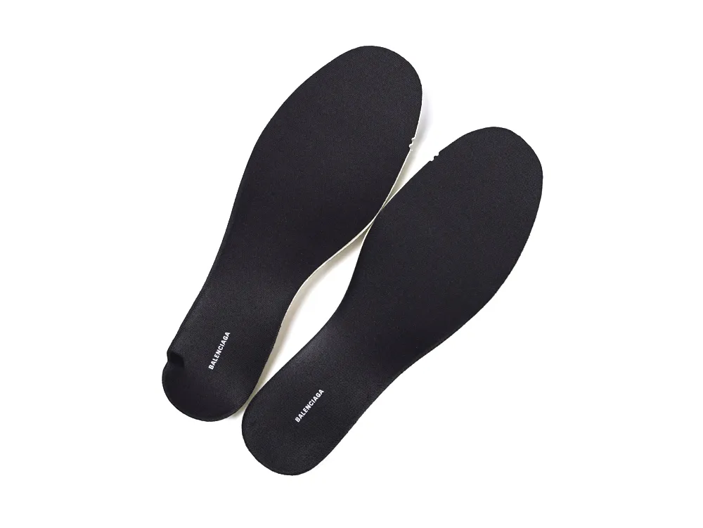 Black insoles made from fabric material, designed for shoe comfort and support.