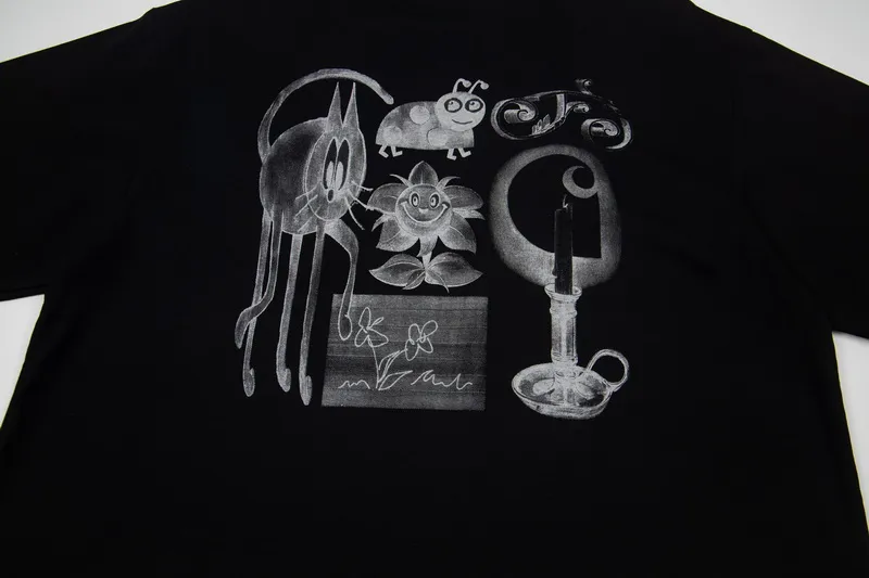 Logo detail in back of T-Shirt