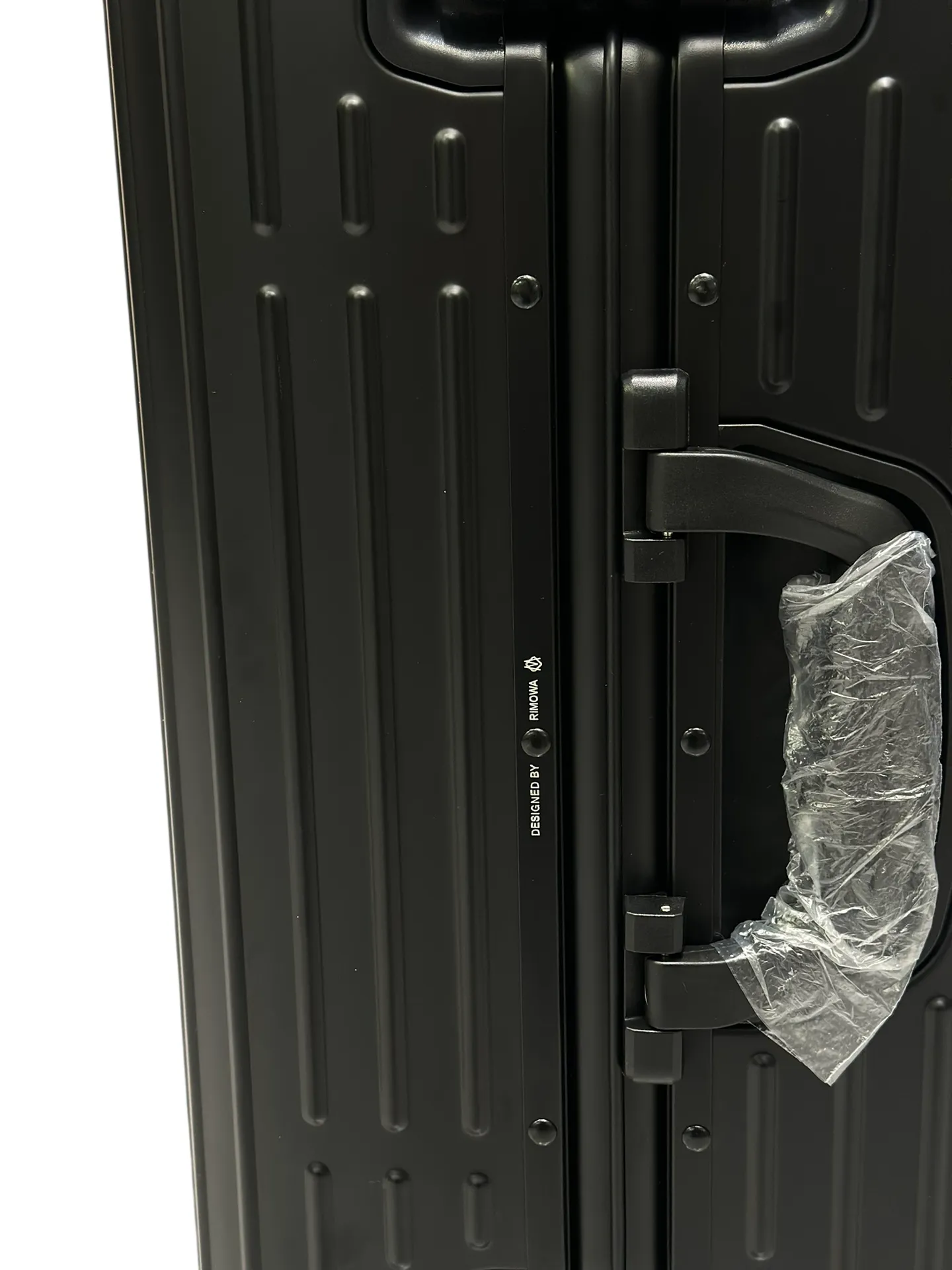 Black luggage side handle detail