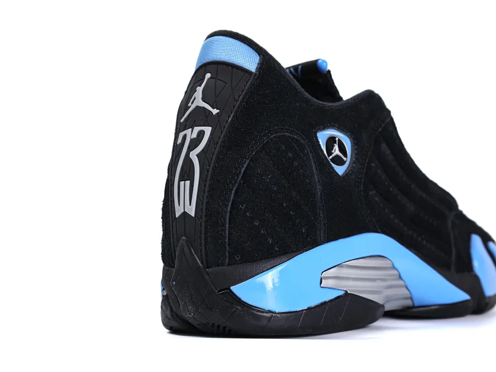 Black and blue suede sneaker with silver accents and rubber sole.