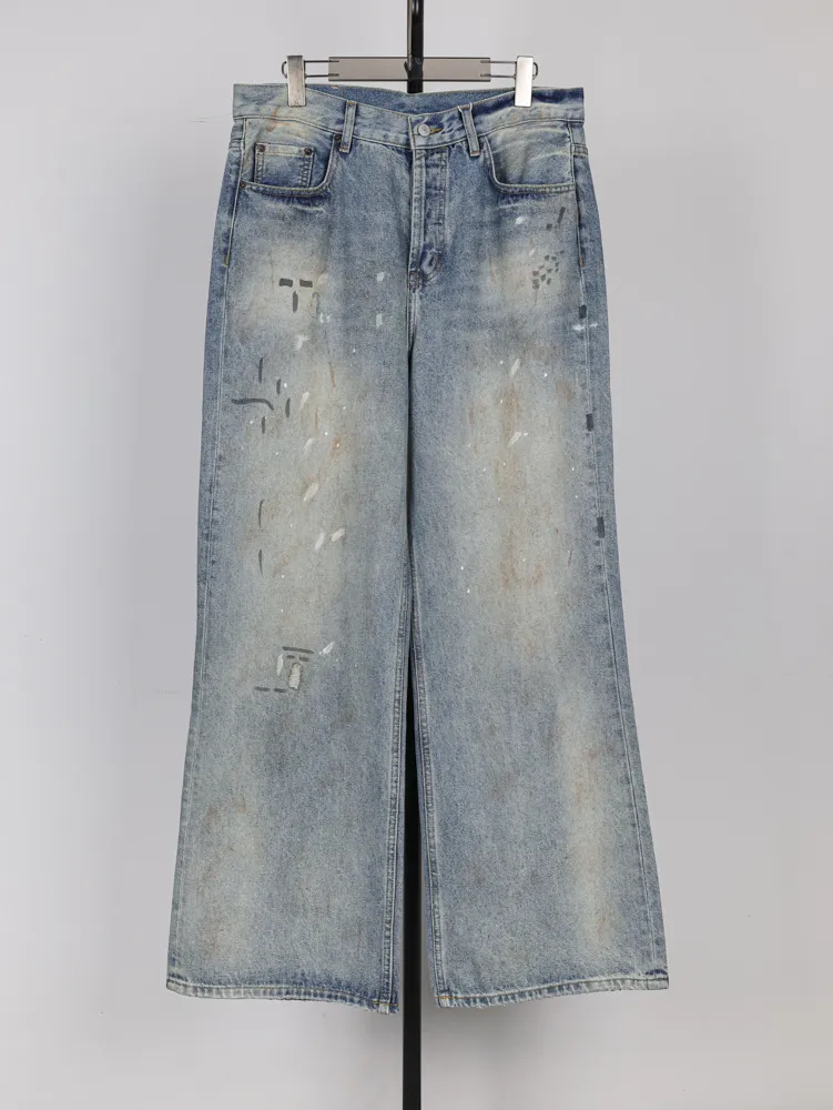 Back of Acne Distressed Splatter Paint Denim Jeans