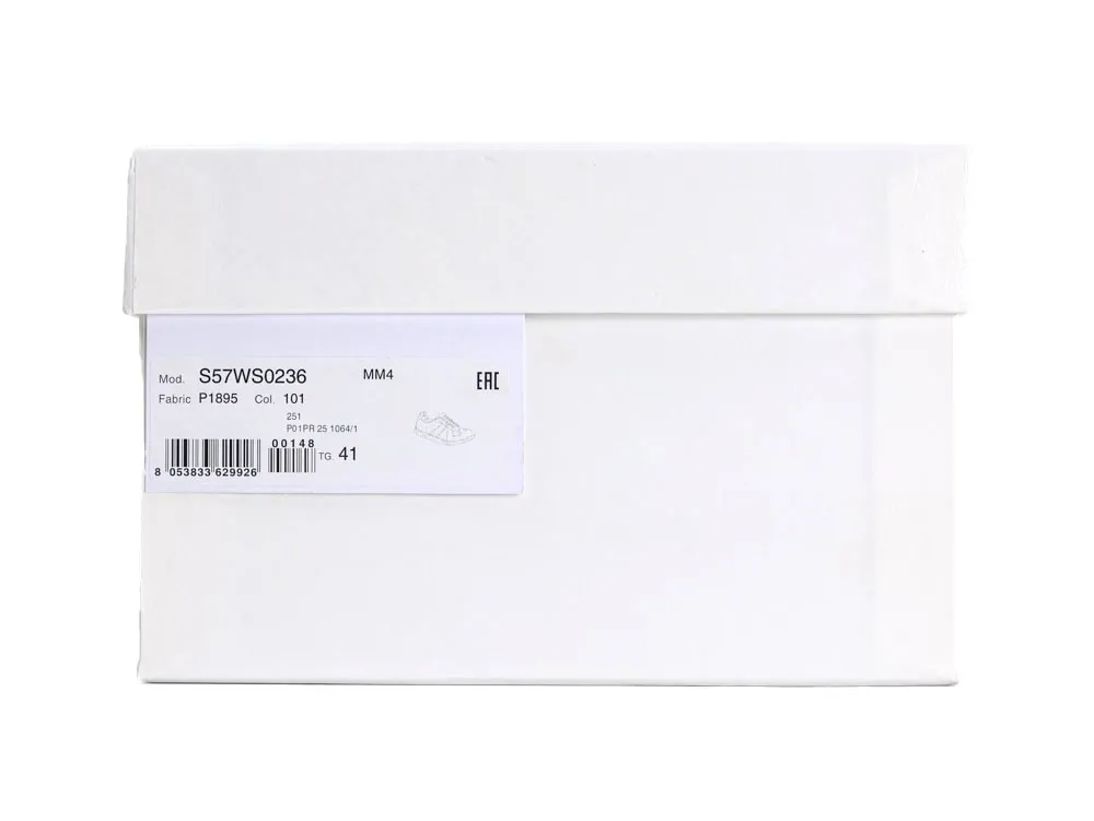 White cardboard shoe box with product label and barcode on the side.