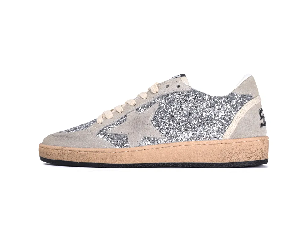 Lateral side view of silver glitter Golden Goose Ball Star sneaker with suede star